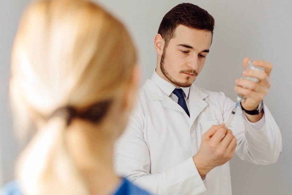 doctor-examines-patient by Nameen Infusion